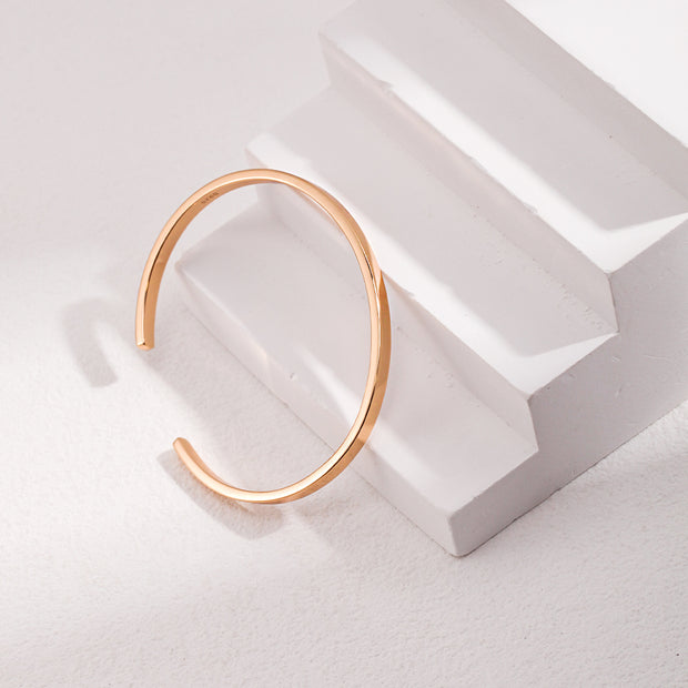 "Radiant Loop" Silver Bangle