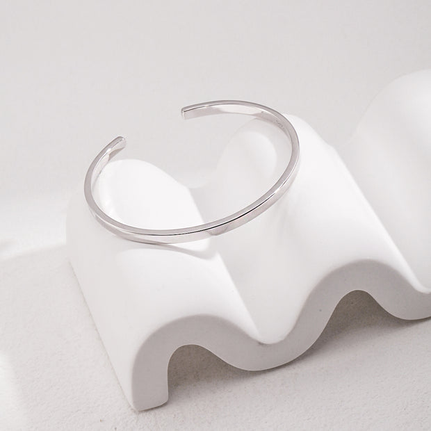 "Radiant Loop" Silver Bangle