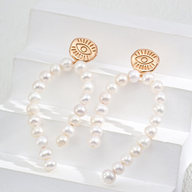 “Pure Muse” Pearl Earrings 1