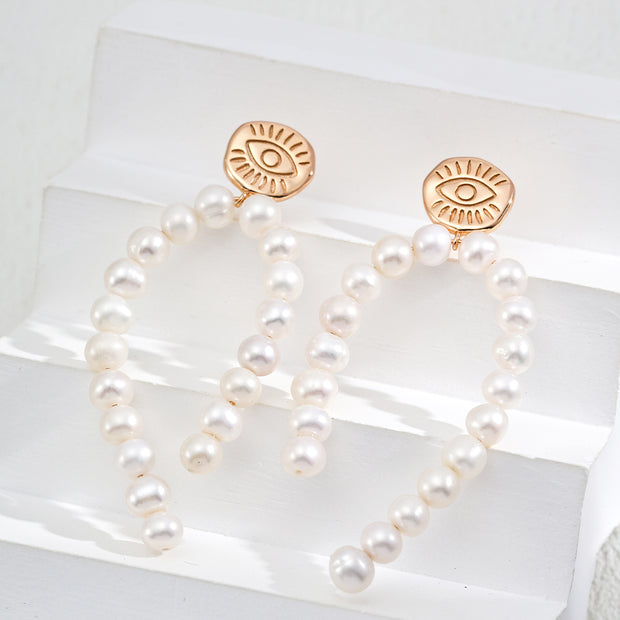 “Pure Muse” Pearl Earrings 1