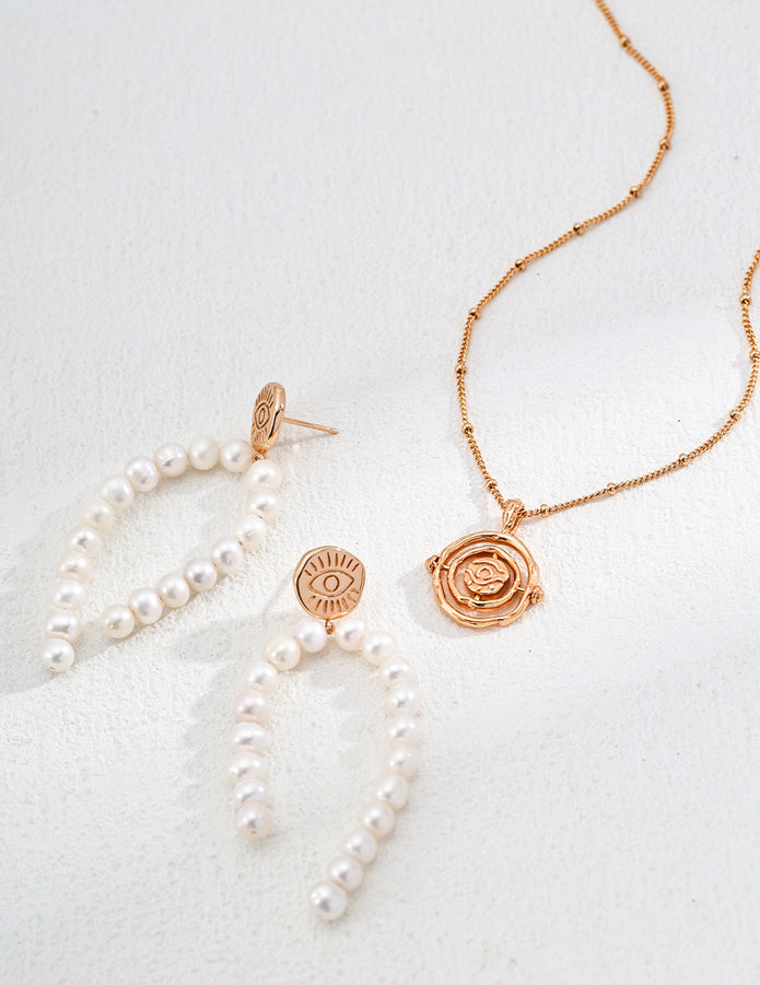 “Pure Muse” Pearl Earrings 1